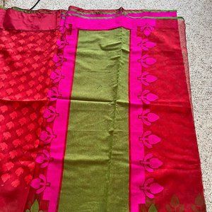 Cute red green saree Net type is for sale.